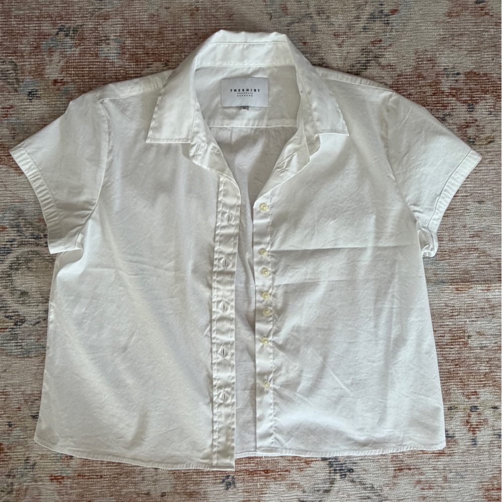 The shirt by Rochelle Behrens White Short-Sleeve button down.